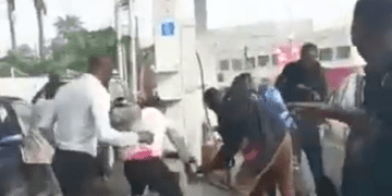 News: Naked woman sprays petrol, threatens to burn Lagos station (Video) 1 News: Naked woman sprays petrol, threatens to burn Lagos station (Video)