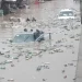 Three men rescued as flood sinks car in Agege (Video)